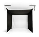 a black fabric enclosure hanging from silver mounts with a large white screen