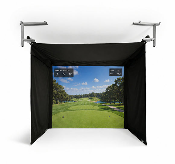 A golf simulator setup with a black fabric enclosure and displaying a golf course on the screen.