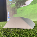 Carl's Place Foam Inserts for DIY Golf Simulator Enclosure displayed on a piece of turf.