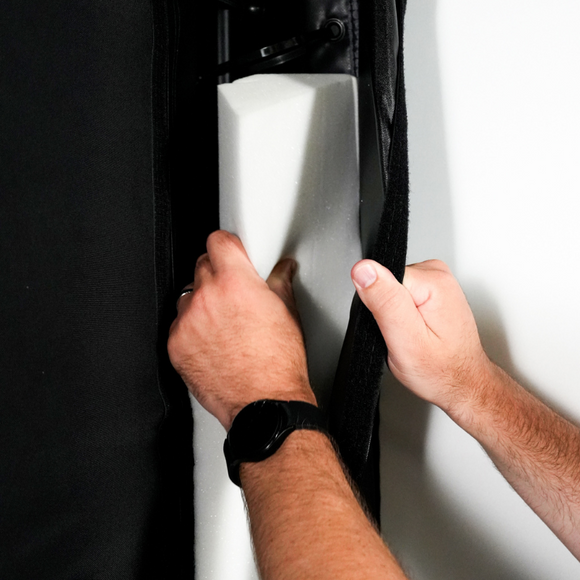 Carl's Place Foam Inserts for DIY Golf Simulator Enclosure being installed.