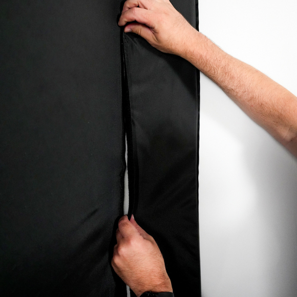 Carl's Place Foam Inserts for DIY Golf Simulator Enclosure being concealed.