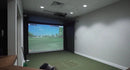 Retractable indoor golf simulator enclosure rolled down with projected image with 4:3 ratio.