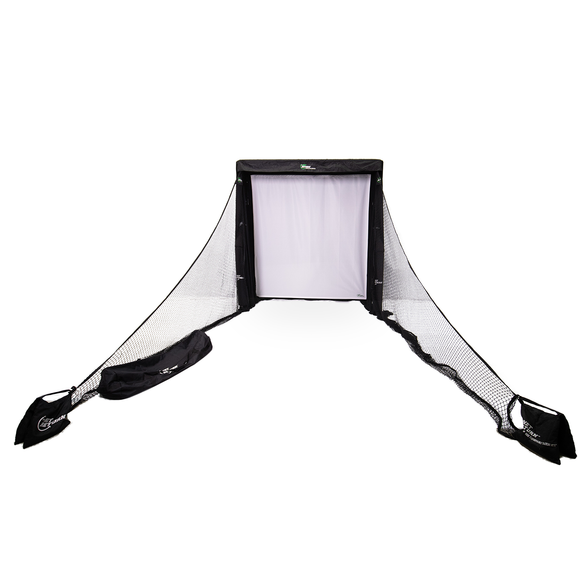 A portable golf hitting net with a black frame and side netting is set up for practice.