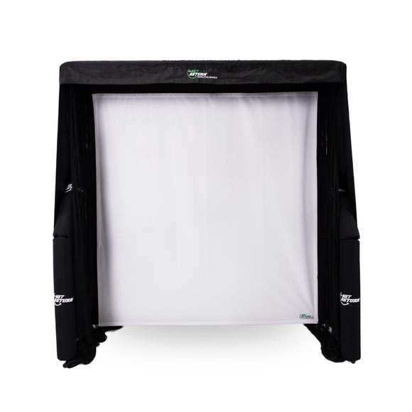 A black and white sports net is set up, designed for indoor use. It has a white mesh backdrop and is surrounded by a black frame.