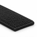 Closeup of a TruSim Systems Carpet Panel Pad lying flat on a white surface