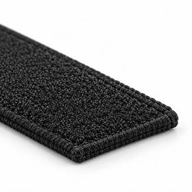 Closeup of a TruSim Systems Carpet Panel Pad lying flat on a white surface
