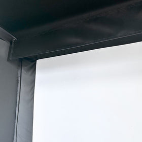 Baffle Accessory attached to golf simulator enclosure