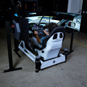 Turnkey Racing Sims triple 45 inch curved OLED monitor setup on the Turnkey freestanding stand, shown on the Formula Motion