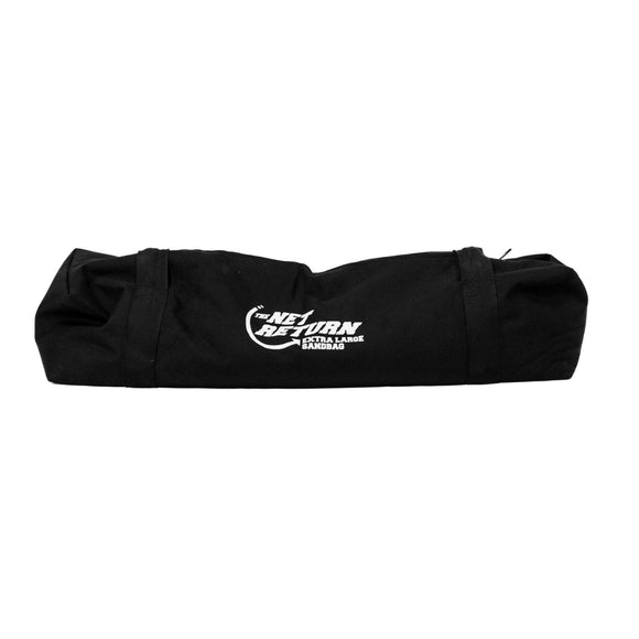 A black fabric bag with a logo that reads "Next Return Handbag" in white text. The bag is cylindrical and appears to be closed.